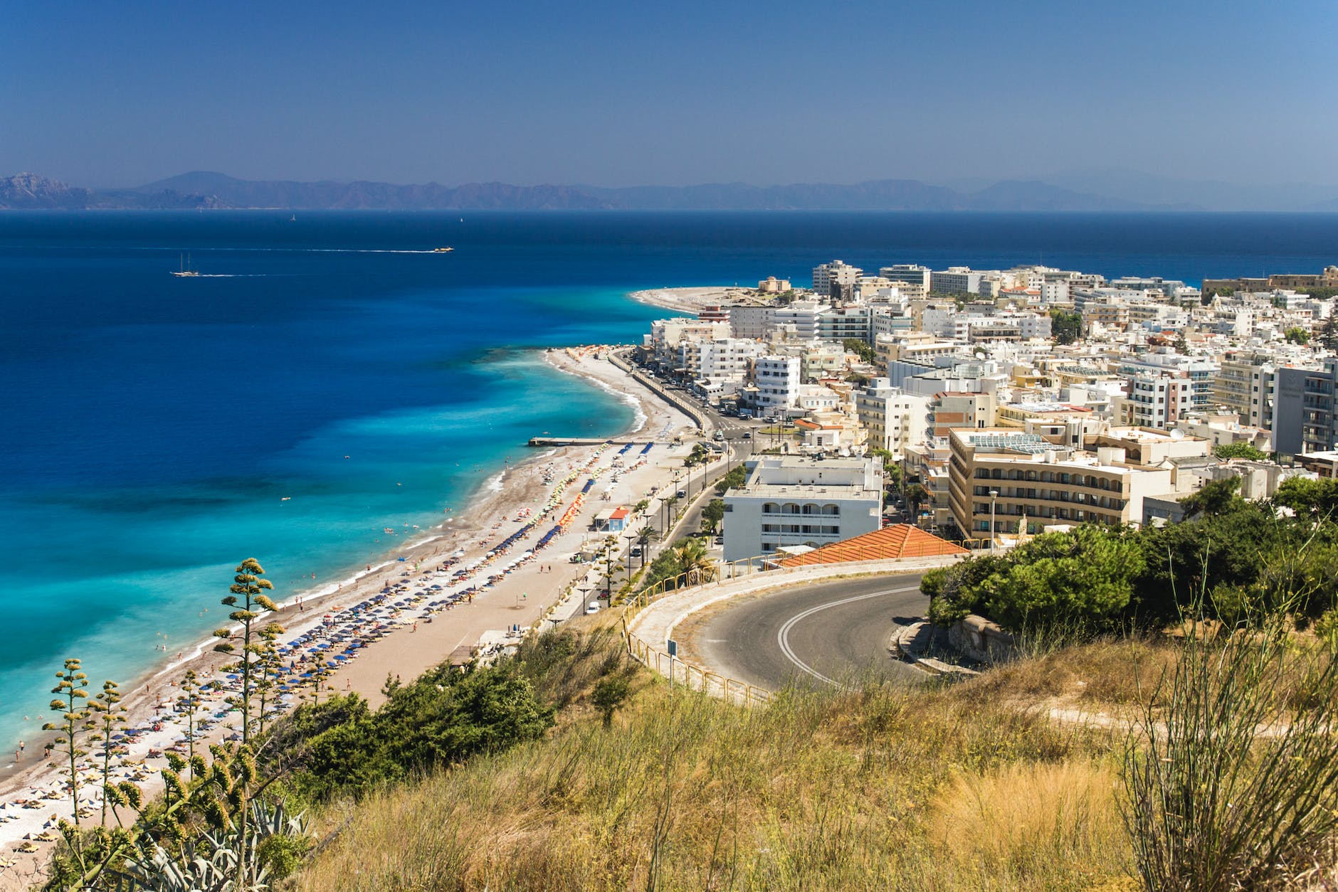 aerial view of city buildings near sea